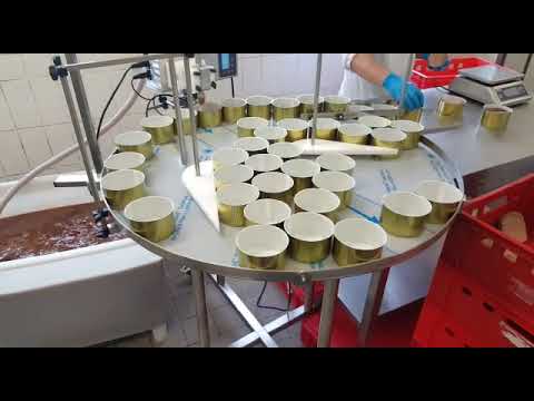 Abfüllung mit Drehtisch & Gebindearrangierer